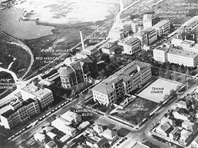 Labeled aerial view of the growing UTMB campus in Galveston, showing hospitals, academic buildings and other facilities.
