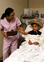 nurse_boy-with-cowboy-hat-in-bed nurse_boy-with-cowboy-hat-in-bed