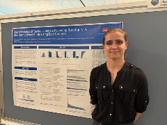 HPTM MD/PhD Student Elizaveta Naydanova smiling at the camera during his poster presentation at the 2025 GSBS Research expo