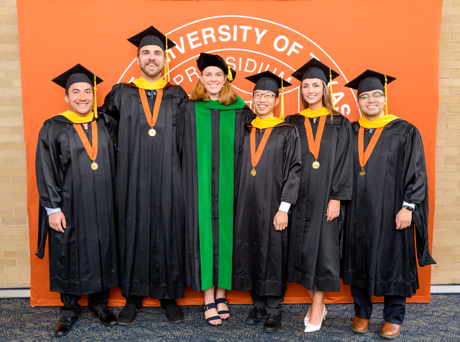 Graduates of the MS in Aerospace Medicine posing for a group photo at 2025 commencement